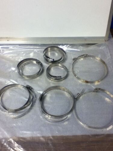 LOT OF 7 DIFFERENT SIZED BRIDGED CLAMPS