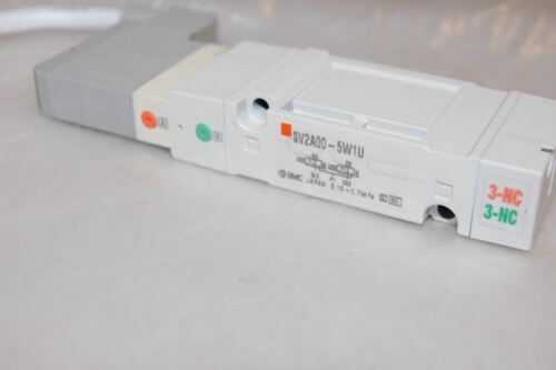 SMC SV2A00-5W1U 4 POSITION DUAL 3 PORT SOLENOID VALVE