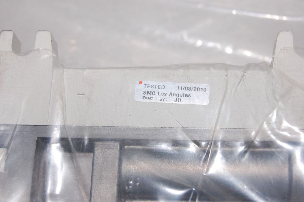 SMC VV5Q41-0602TLU2 Manifold W/ Plug In